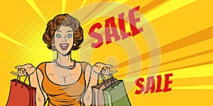 Joyful woman shopping on sale