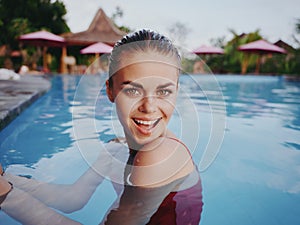 joyful woman Swimming in the pool vacation tropics bali