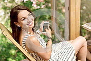 Joyful woman using cell phone