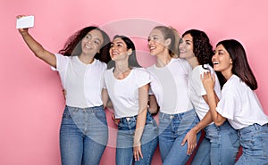 Joyful Women Making Selfie On Mobile Phone Over Pink Background