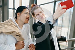 Joyful Young Couple Taking Selfie at Museum Visit