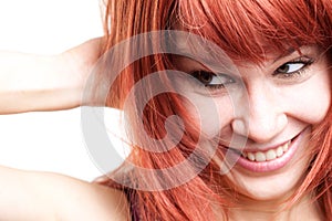 Joyful young woman with cute shy expression