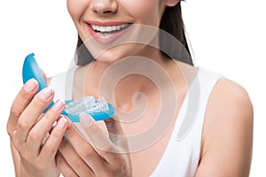 Joyful young woman is ready for clear-aligner treatment