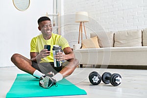 joyous african american man with sports