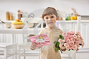 joyous cute toddler boy in casual