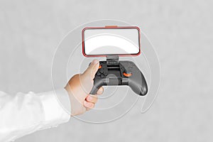 Joystick with a smartphone mockup in the hands of a guy. On a light background