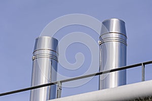 _JP31769-Chimneys - Chimneys on a building roof in Alsace, France.