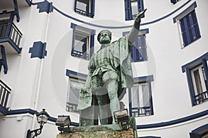 Juan Sebastian Elcano statue in Guetaria village, Euskadi photo