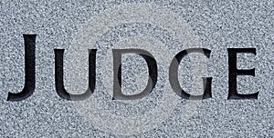 Judge carved in stone