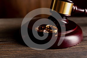 Judge gavel deciding on marriage divorce