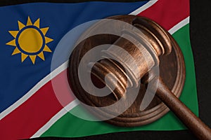 Judge Gavel and flag of Namibia. Law and justice in Namibia. Violation of rights and freedoms