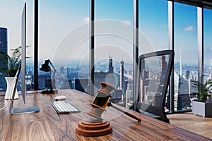 Judge gavel internet law concept; office chair in front of modern workspace with computer and skyline view; lawsuit concept; 3D