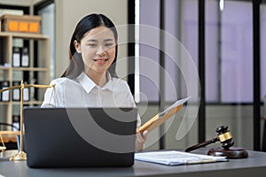 Judge gavel with Justice lawyers, Business woman in suit or lawyer working on a documents. Legal law, advice and justice