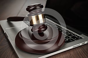 Judge gavel on laptop concept