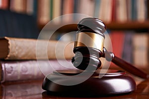 Judge gavel or law mallet on a wooden desk