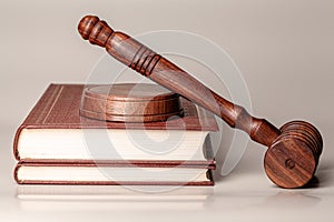 Judge gavel and legal book close up on table