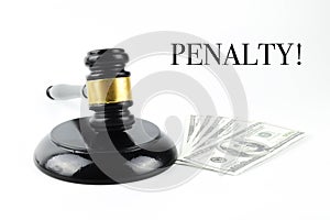 Judge gavel and money banknotes over white background written with PENALTY