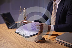A judge gavel is prepared in the courtroom to be used to give a signal when the verdict is read after the trial is completed.