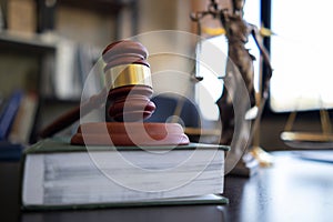 A judge gavel is prepared in the courtroom to be used to give a signal when the verdict is read after the trial is completed.