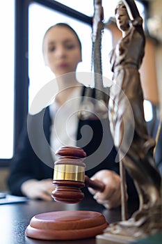 A judge gavel is prepared in the courtroom to be used to give a signal when the verdict is read after the trial is completed.