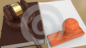 Judge gavel and red FELONY stamp on the paper. Court related 3d animation