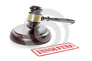 Judge gavel and a red stamp with the German word Insolvenz meaning insolvency isolated on a white background