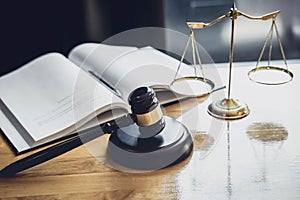 Judge gavel with Scale of justice, object documents working on table in courtroom, Legal law advice and justice concept