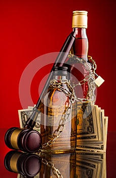 Judge gavel and whisky bottles