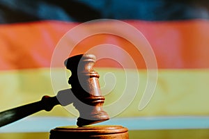 Judge hammer and flag of Germany. Law of Germany concept. Violation of rights