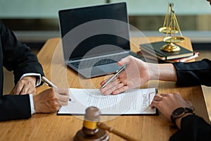 Judge, male lawyer, businessman`s legal services business advisor Consulting on various contracts to plan a case in the court of j