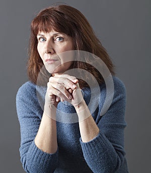 Judge mental concept for dubious 50s woman