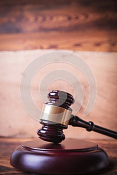 Judge`s gavel in front of oak board