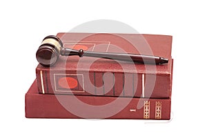 Judge's gavel and legal books on white background