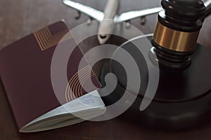 Judge`s gavel, passport and airplane