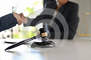 A judge`s hammer or judge`s gavel on the office desk