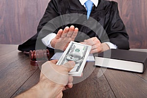 Judge taking bribe from client