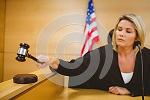 Judge about to bang gavel on sounding block