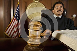 Judge Using Gavel In Court