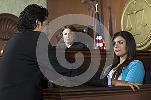 Judge Watching Prosecution In Court photo