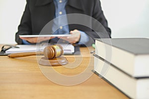 judge work with tablet. legal law gavel at courtroom. lawyer attorney justice at court