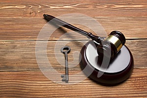 Judges Auctioneer Gavel, Retro Door Key On The Wood Table. Concept For Trial, Bankruptcy, Tax, Mortgage, Auction