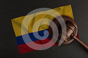 Judges gavel and the flag of Colombia. Law and Justice. Constitutional law