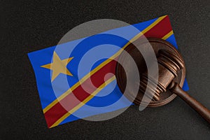 Judges gavel and the flag of Democratic Republic of the Congo. Law and Justice. Constitutional law