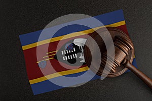 Judges gavel and the flag of Eswatini. Law and Justice. Constitutional law