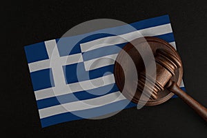 Judges gavel and the flag of Greece. Law and Justice. Constitutional law