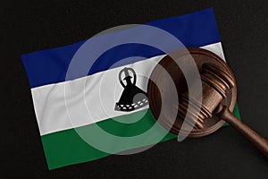 Judges gavel and the flag of Lesotho. Law and Justice. Constitutional law