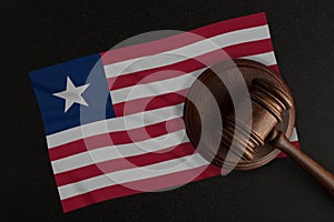 Judges gavel and the flag of Liberia. Law and Justice. Constitutional law