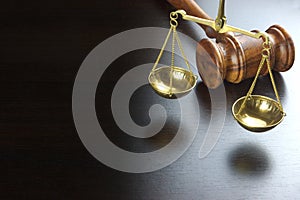 Judges Gavel And Scale Of Justice On The Black Table