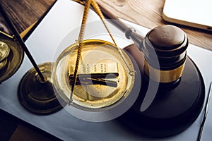 Judges Gavel And Scale Of Justice On The Black Table Background In Back Light. Overhead View. Law Concept. Abstract Web Banner