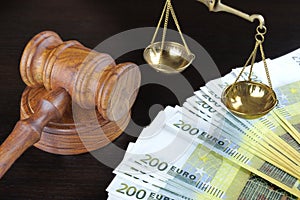 Judges Gavel, Scale Of Justice And Euro Cash On Table